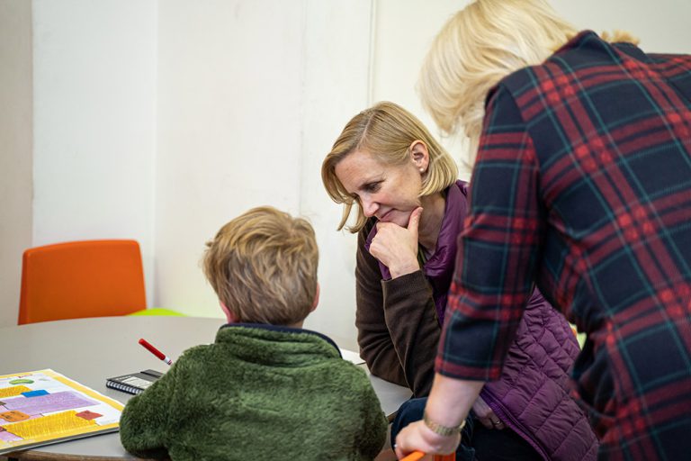 Children and teacher at Sunday School at St Columba's