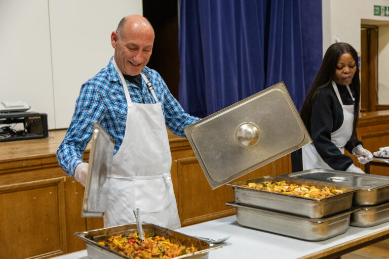 Kevin ready to serve food